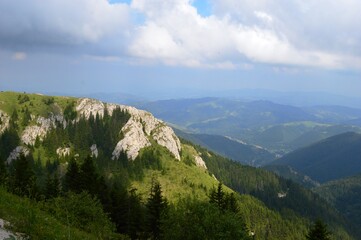 Naklejka premium mountain peaks illuminated by the sun