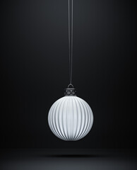 Hanging matt white vertically ribbed Christmas ball.