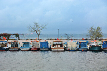 Fishing boats docked in the harbor. Canakkale, Turkey, October 17, 2020.