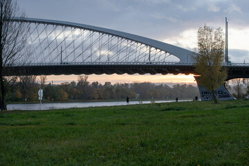 white construction of a transport bridge for cars and trams .modern transport bridge over the Vltava river in the center of the city of Prague in the Czech Republic 30 October 2020