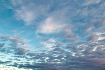 Blue summer sky with white cumulus clouds. Blue sky with clouds nature background.