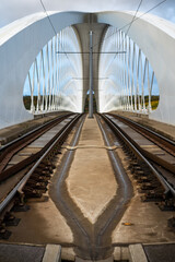 Obraz premium white construction of a transport bridge for cars and trams .modern transport bridge over the Vltava river in the center of the city of Prague in the Czech Republic 30 October 2020