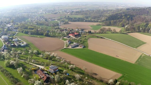 4k aerial footage of austrian village in spring