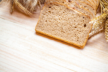 Home baked bread. Rye bakery with crusty loaves and crumbs. Fresh rustic traditional bread with...