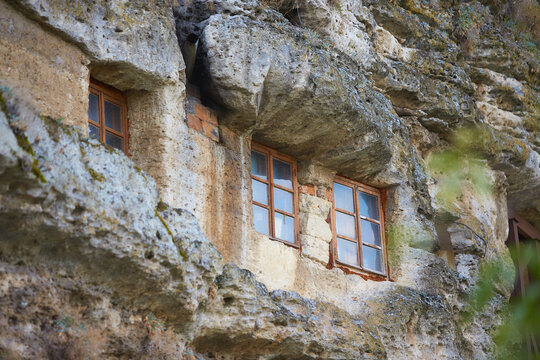 Rocky monastery in Tipova Moldova. Cave Monastery built into cliffs.