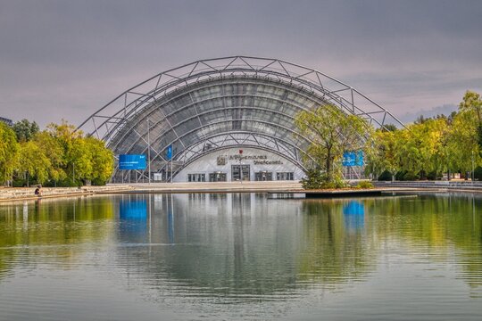 Leipzig, Germany-August 28,2019. View of the entrance area with the glass hall and the congress center of the trade fair grounds of Leipziger Messe, Leipzig Germany, taken from the forecourt