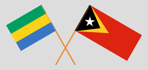 Crossed flags of Gabon and East Timor