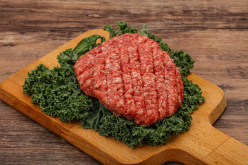 Raw beef burger cutlet for cooking