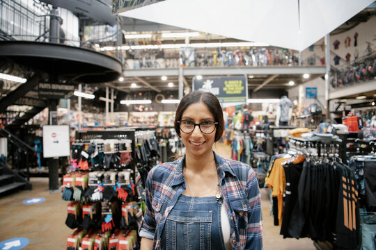 Portrait Smiling Female Bike Shop Owner