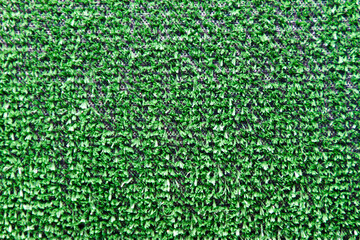Fototapeta premium Textura verde de plastico imitando planta o cesped