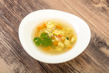 Tasty chicken soup with carrot