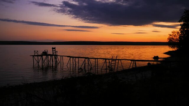 Calm river at sunset in the peacful evening