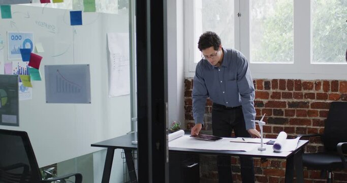 Man using digital tablet at office