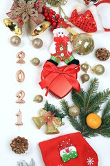 Fototapeta na wymiar Christmas decorations, postcard, banner for showing, Happy new year 2021 background with branches with balls and ribbons in snow flakes, product decoration for holiday advertising, selective focus