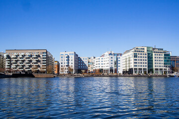 Stockholm, Sweden - April 17 2019 : Office buildings by the waterfront in Marievik - obrazy, fototapety, plakaty