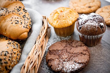 Fresh pastries buns wicker basket rustic style bakery