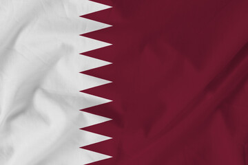 Obraz premium Flag of Qatar on Fabric texture