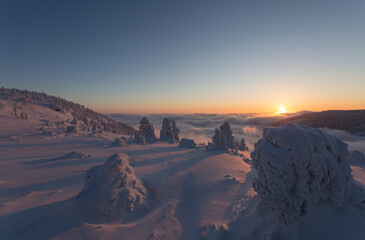 Fototapeta na wymiar sunset over frozen landscape
