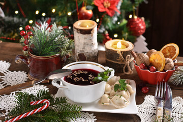 traditional in Poland Christmas Eve  red borscht and dumplings with sauerkraut and mushroom filling