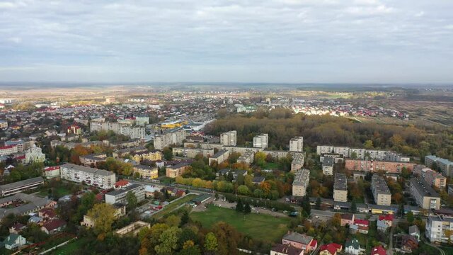 Aerial drone view of Drohobych city, pull back with pan
