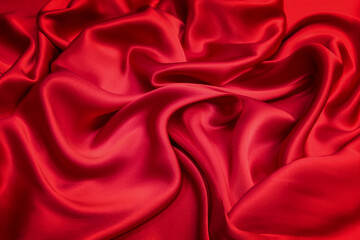 Plakat Red silk or satin luxury fabric texture as abstract background for wedding or christmas theme. Top view.