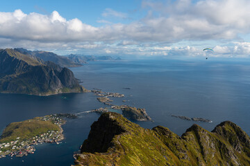 Fototapeta na wymiar paraglider over the sea and mountain