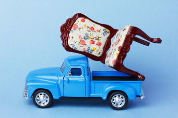 Service for the transportation of furniture.  Moving day concept. © Maria