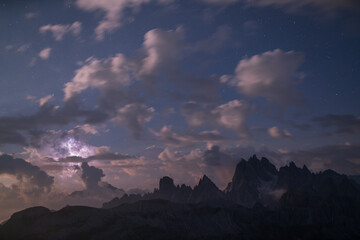 storm over mountains in dolomites