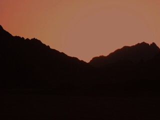 The desert landscape around the historic site of Hatshepsuts Temple in Luxor, Egypt