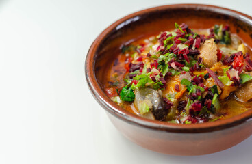 Traditional Hungarian beef stew with potatoes, pepper, tomato and mushrooms