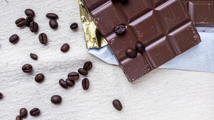 Photo of chocolate bar, coffee beans