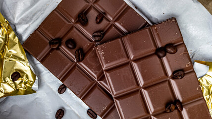 Photo of chocolate bar, coffee beans