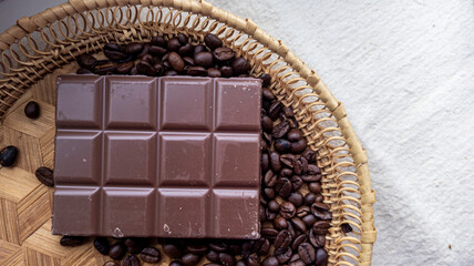 Photo of chocolate bar, coffee beans