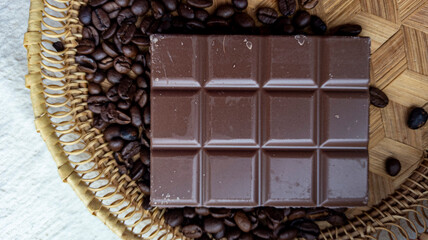 Photo of chocolate bar, coffee beans