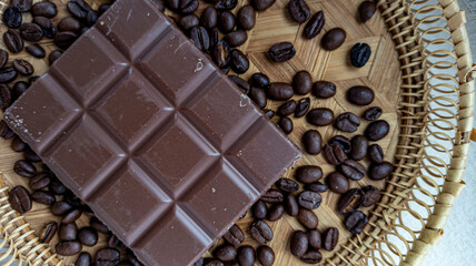 Photo of chocolate bar, coffee beans