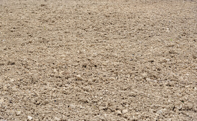 Ground soil as an abstract background close-up.