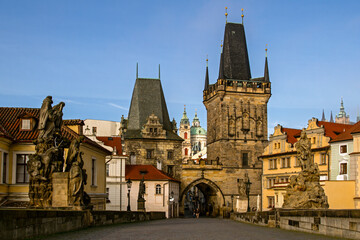 Fototapeta na wymiar PRAGUE. CZECH REPUBLIIC. On October 25.2020. The famous Charles Bridge one of the famous destinations in Prague. European travel. The decoration is sculptures and statues. Europe . 