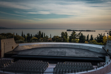 Fototapeta na wymiar Sunset over lake Garda in Italy seen from an amphitheater 2