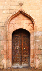 Fototapeta na wymiar Traditional door with stones