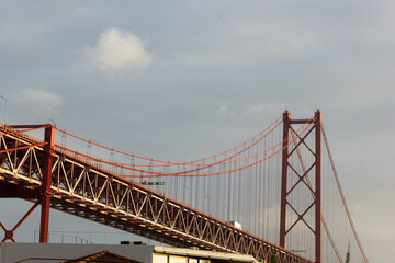 Famous red bridge in Lisbon, Portugal. Outstanding engineering construction concept