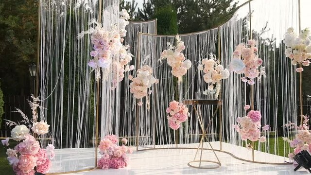 Wooden wedding hall is decorated with wedding decor. Beautiful wedding