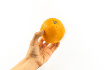 Big orange in hand on white isolated background