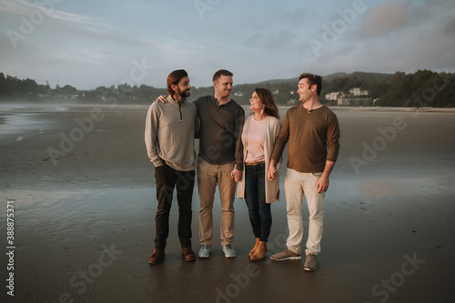 Mother with Adult Sons on Beach
