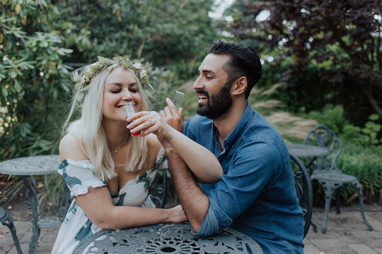 Tipsy Couple Drinking Wine Together