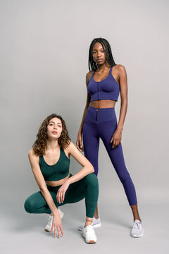 Confident diverse athletes in stylish sportswear