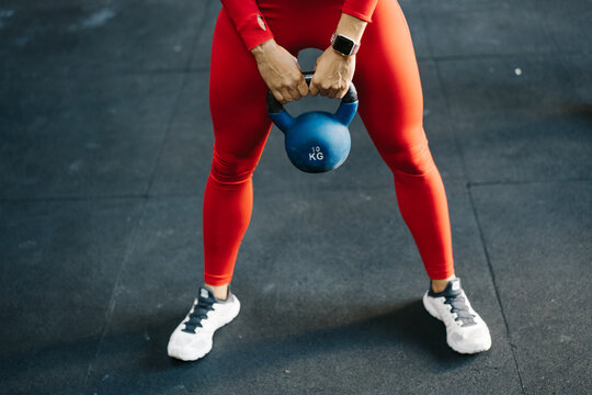 Athlete exercising with kettlebell