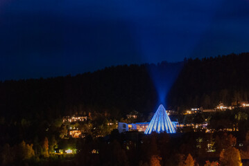 The scenery of night Karasjok village with blue illuminated Sami parliament building, Norway © Ilona