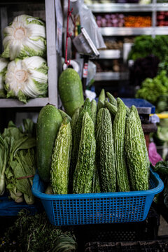 Cucumber and karela on a Peruvian market