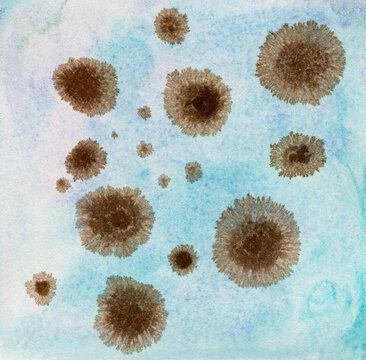 Brown ink on blue background