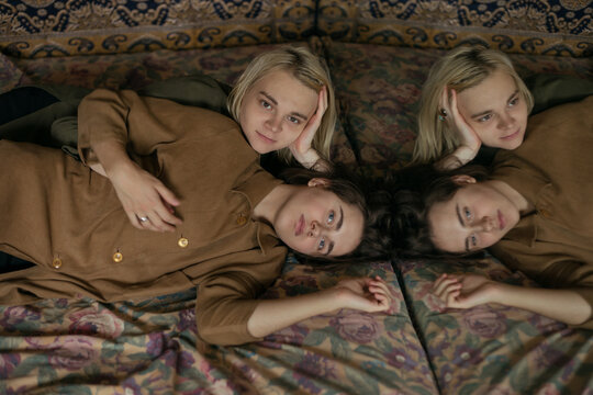 photo of two gays and their reflection in the mirror